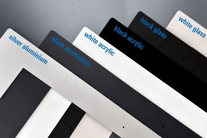 From left to right: silver aluminium, black aluminium, white acrylic, black acrylic, black glass, white glass